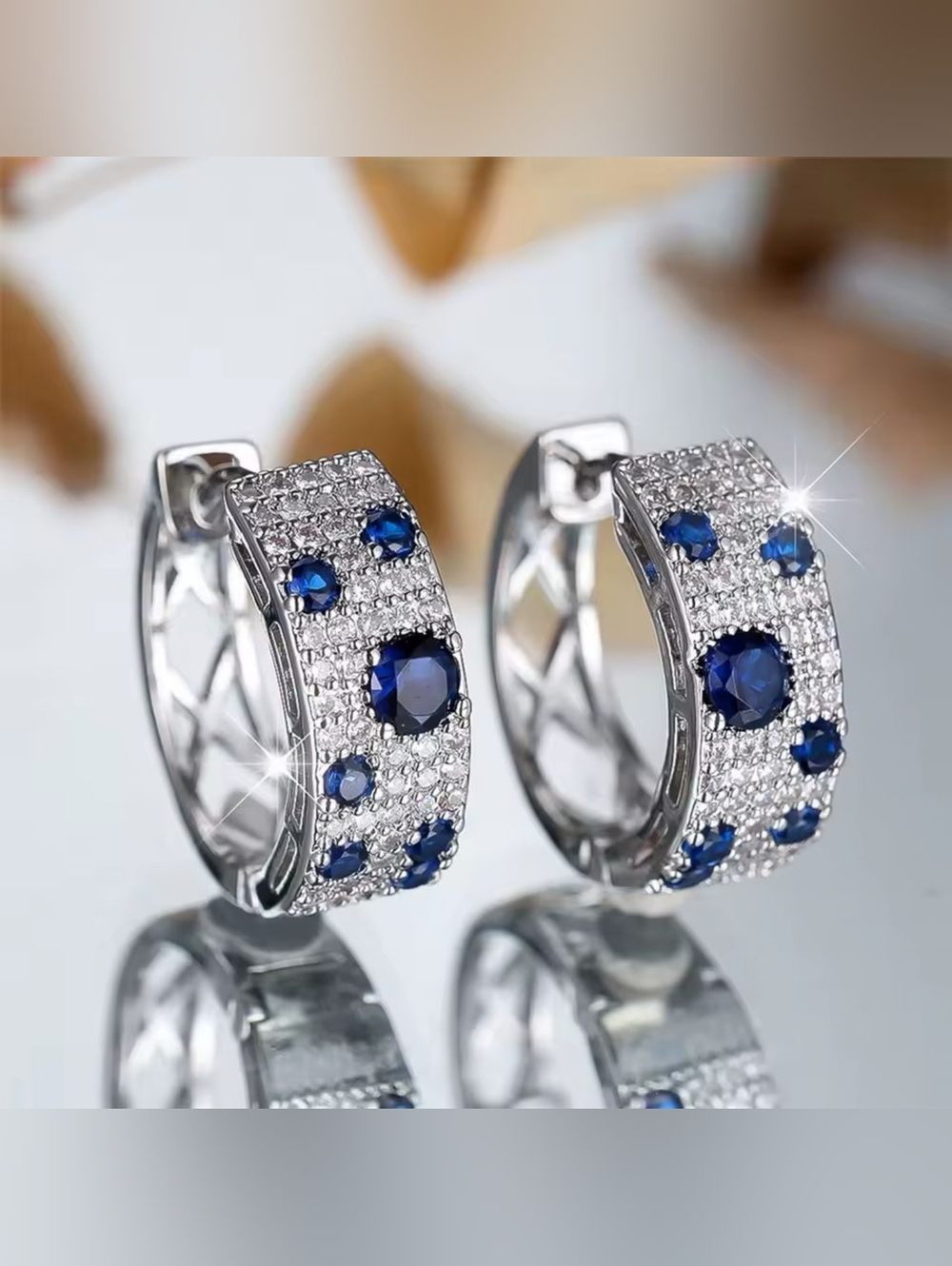 Silver Hoop Earrings With Blue Crystal Accents